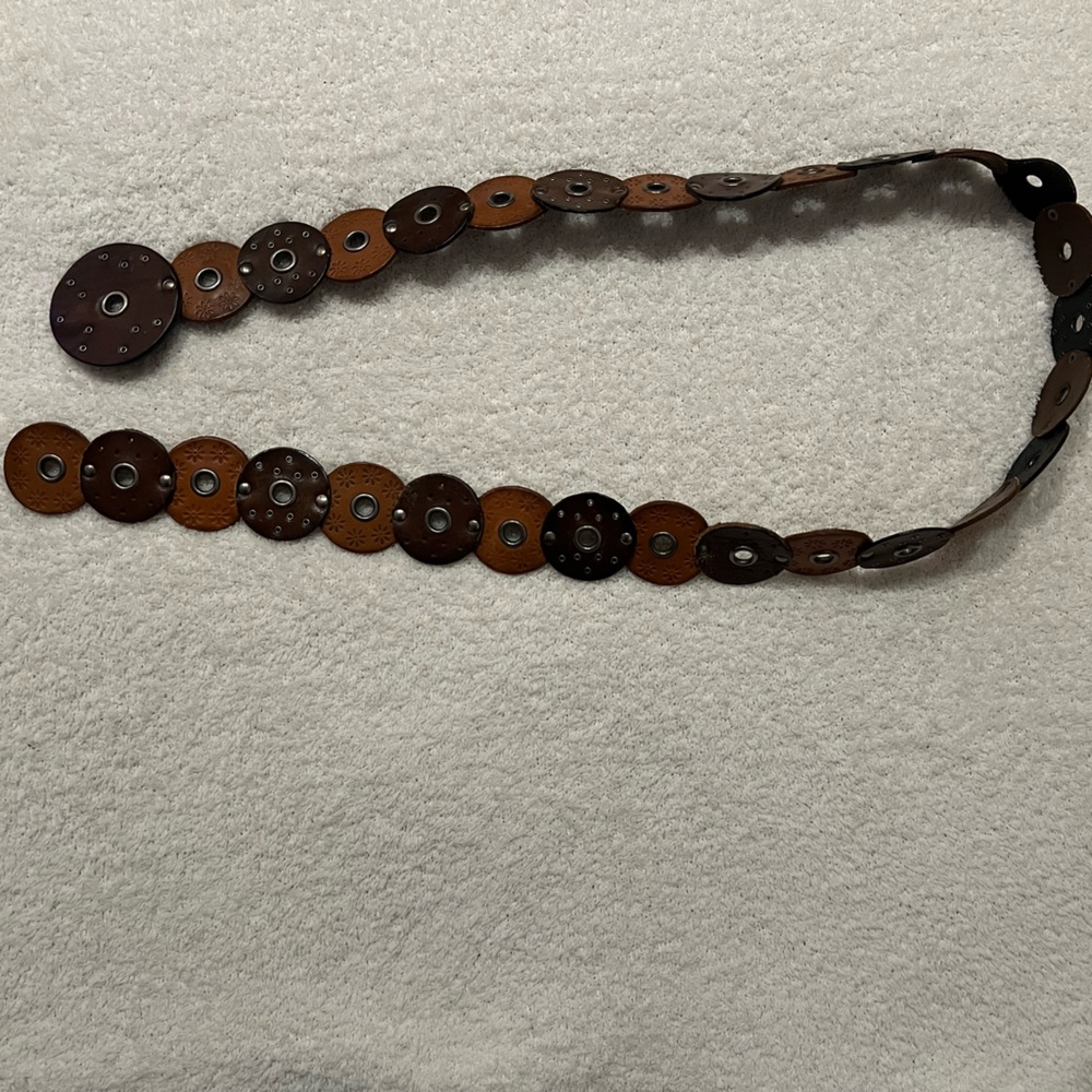 Leather medallion belt with silver accents